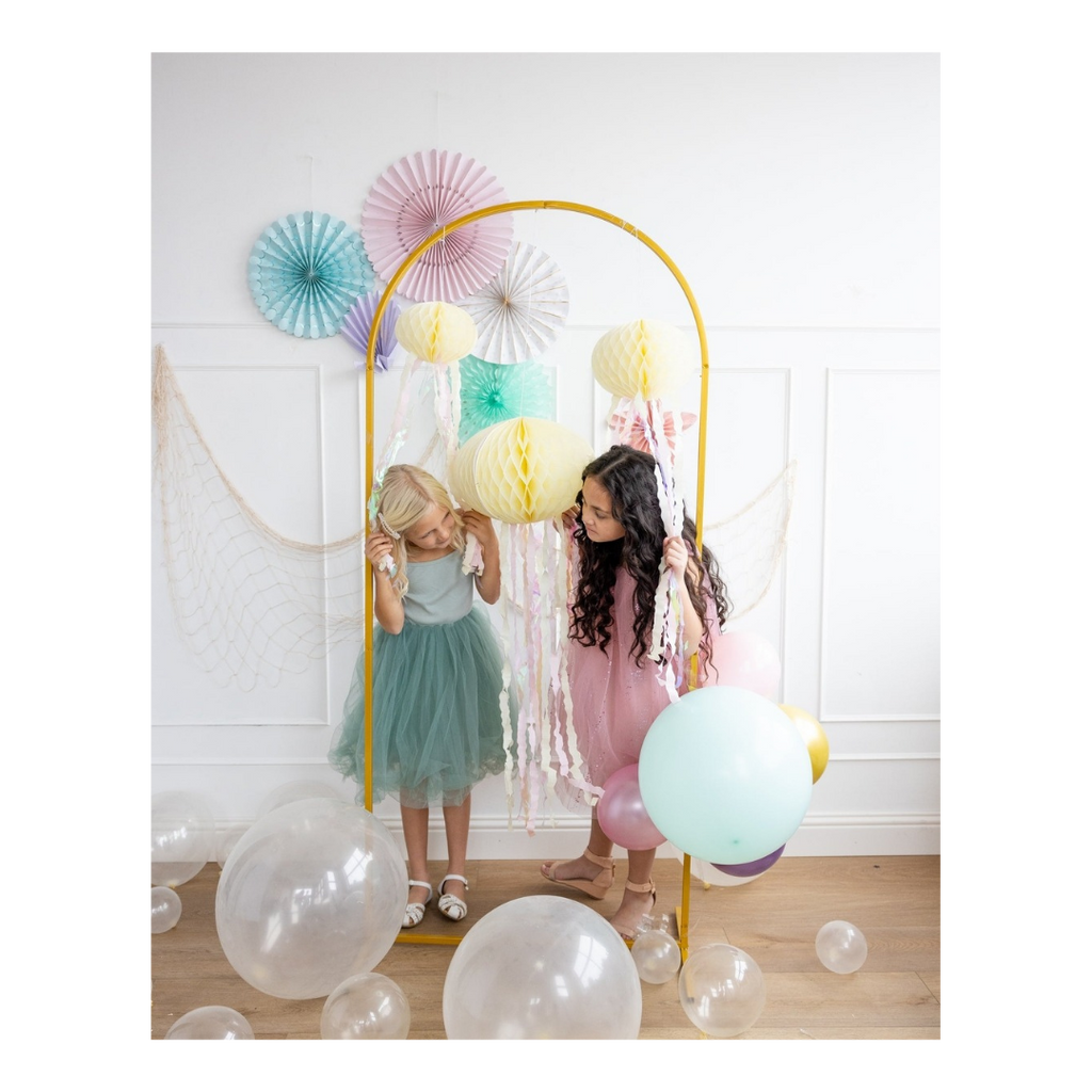 Pastel color balloon arch with lanterns birthday theme decor from Parte Haus party supply store in Bethesda MD