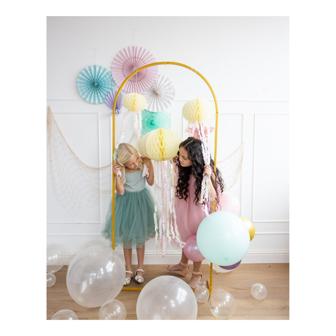 Pastel color balloon arch with lanterns birthday theme decor from Parte Haus party supply store in Bethesda MD