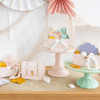 Pastel mermaid treasure chest favor boxes with seashell and candy bracelets under the sea theme from Parte Haus party supply store in Bethesda Maryland