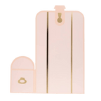 Pink suitcase shaped invitation card with gold foil for travel theme from Parte Haus party supply store in Bethesda Maryland