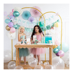 Pastel mermaid birthday decorations and dessert table with balloons and girls from Parte Haus party supply store in Bethesda MD