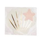 White and gold seashell paper placemat with star label under the sea theme from Parte Haus party supply store in Bethesda, MD