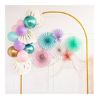 Pastel and gold balloon arch with colorful paper fans for birthday from Parte Haus party supply store in Bethesda MD
