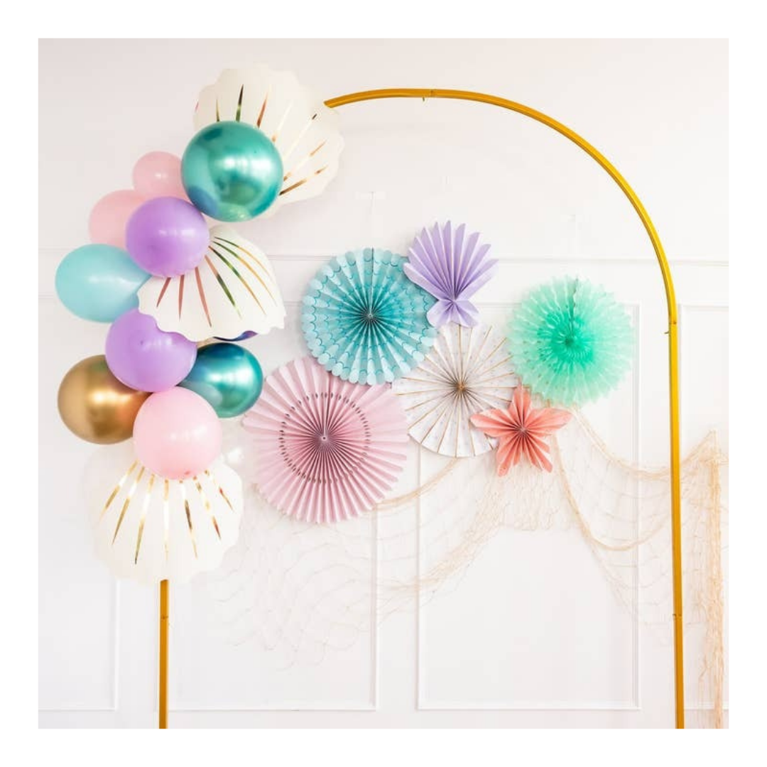 Pastel and gold balloon arch with colorful paper fans for birthday from Parte Haus party supply store in Bethesda MD