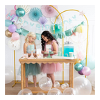 Pastel mermaid birthday decorations with balloons and cake table from Parte Haus party supply store in Bethesda Maryland