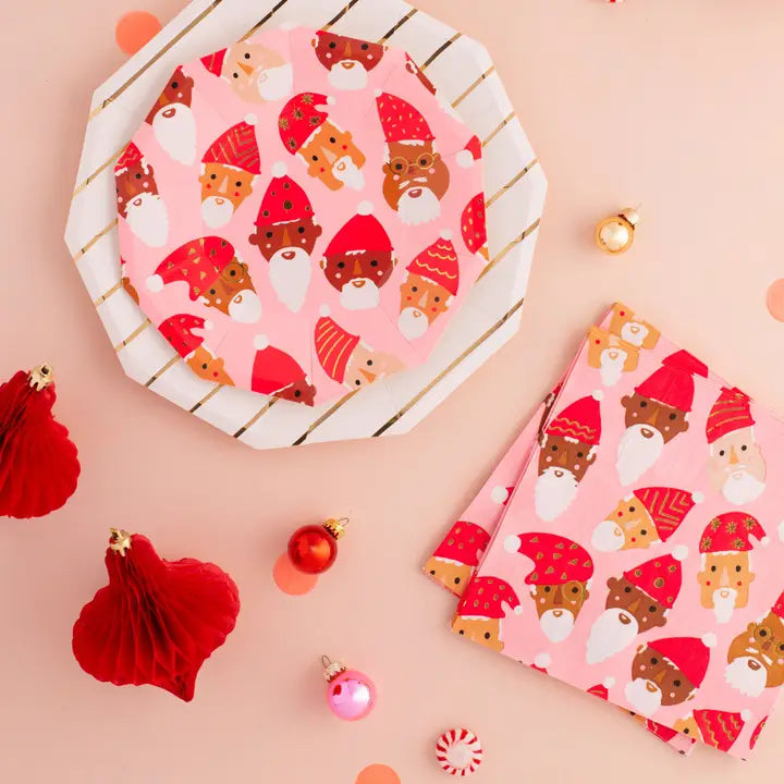 Pink Christmas Santa plates and napkins with festive faces holiday theme from Parte Haus party supply store in Bethesda Maryland