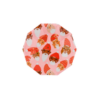 Pink Christmas small plate with Santa faces holiday design from Parte Haus party supply store in Bethesda MD