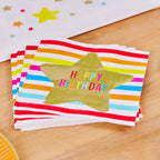 Colorful striped happy birthday napkins with gold star birthday theme from Parte Haus party supply store in Bethesda MD