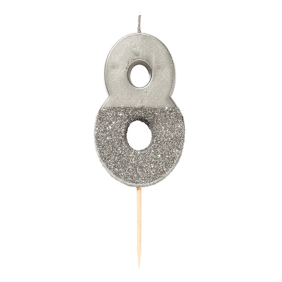 Silver glitter number 8 candle for birthday from Parte Haus party supply store in Bethesda Maryland