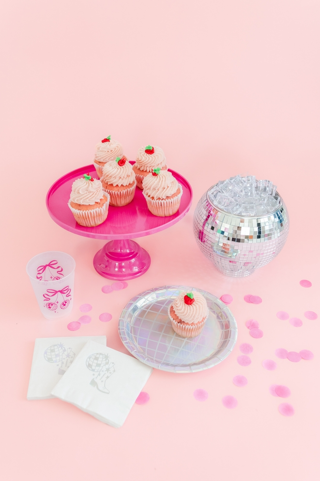 Silver holographic dinner plate with disco ball pattern for birthday from Parte Haus party supply store in Bethesda Maryland
