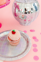 Silver holographic disco ball dinner plate with cupcake for birthday from Parte Haus party supply store in Bethesda MD