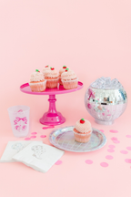 Silver holographic dinner plate with cupcake disco birthday theme from Parte Haus party supply store in Bethesda MD