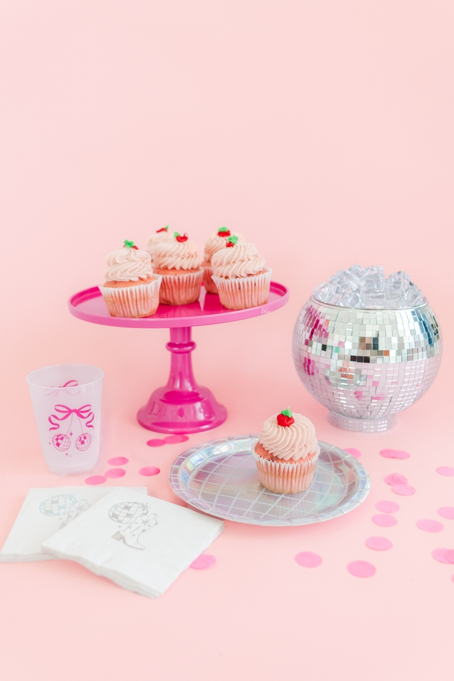 Silver holographic dinner plate with cupcake disco birthday theme from Parte Haus party supply store in Bethesda MD