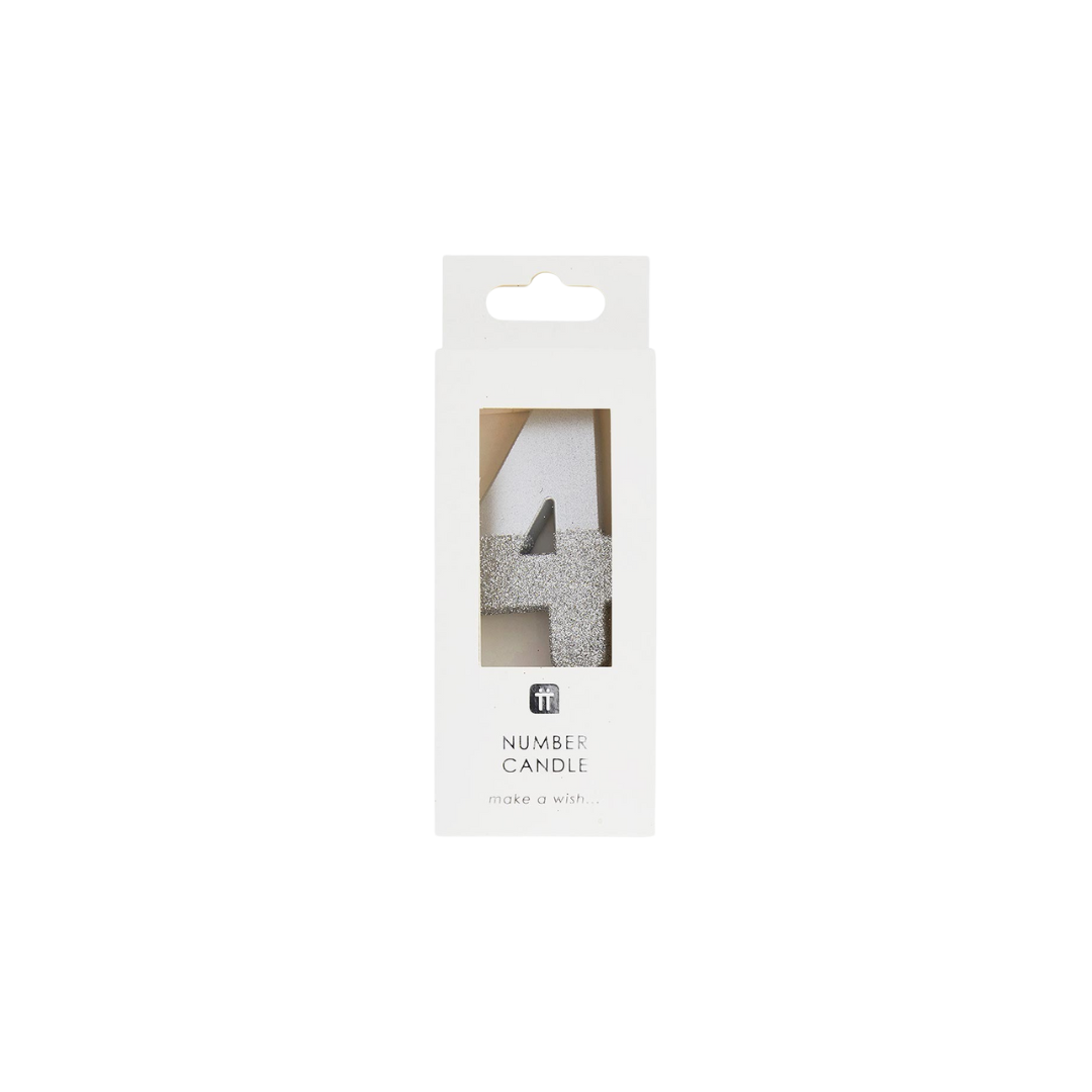 Silver number 4 candle in glitter finish for birthday celebration from Parte Haus party supply store in Bethesda Maryland