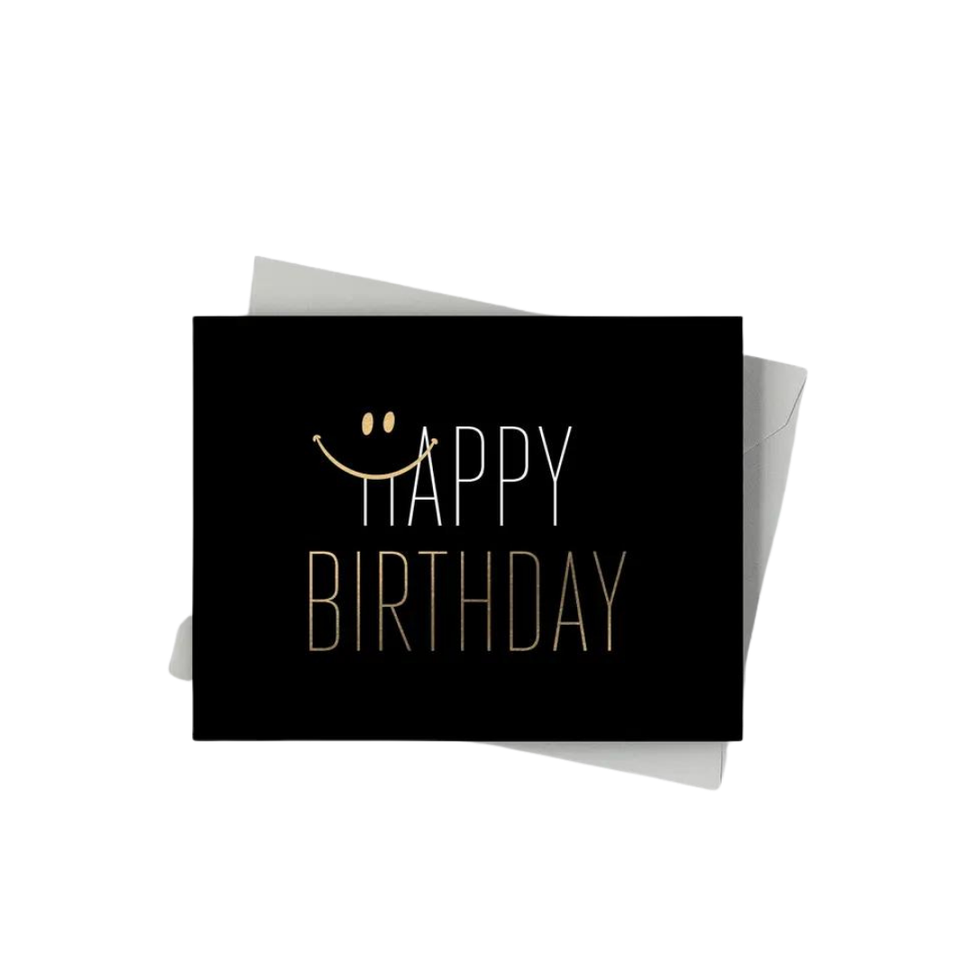 Black gold birthday greeting card with smiley face from Parte Haus party supply store in Bethesda Maryland
