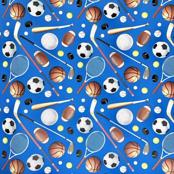 Blue sports gift wrap with assorted balls and equipment for sports birthday from Parte Haus party supply store in Bethesda MD
