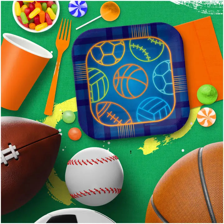 Blue sports theme dessert plate with assorted sports ball designs for birthday from Parte Haus party supply store in Bethesda MD