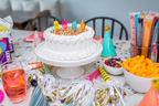 yellow pink and blue striped party horns with white fringe for birthday from Parte Haus party supply store in Bethesda Maryland