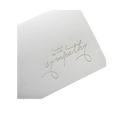 White sympathy card with elegant script condolence message from Parte Haus party supply store in Bethesda Maryland