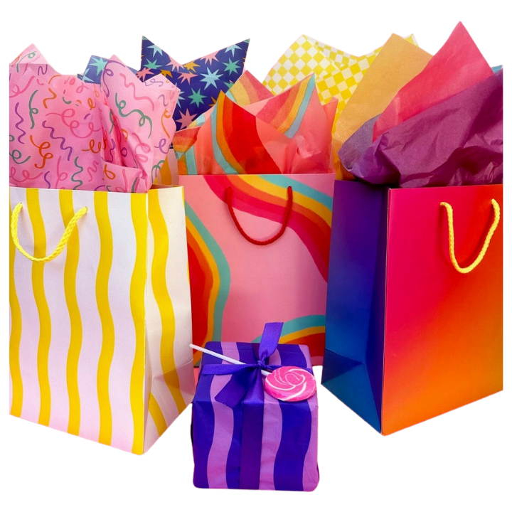 Colorful gift bags and wrapped present celebration theme from Parte Haus party supply store in Bethesda Maryland