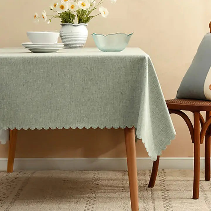 Grey tablecloth scalloped edge modern table setting home decor from Parte Haus party supply store in Bethesda MD