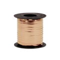 Gold curling ribbon spool for gift wrapping celebrations from Parte Haus party supply store in Bethesda MD