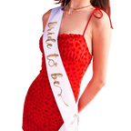 Red heart dress and white bride to be sash for bachelorette from Parte Haus party supply store in Bethesda Maryland