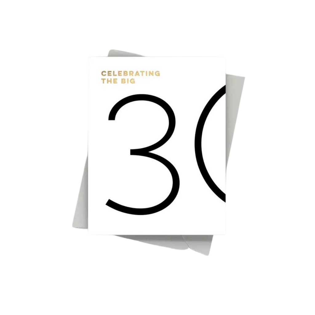 White 30th birthday card with bold black number and gold text from Parte Haus party supply store in Bethesda MD