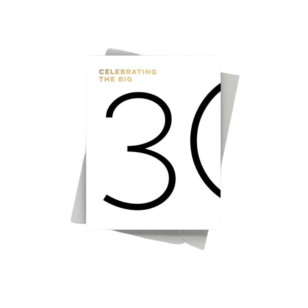 White 30th birthday card with bold black number and gold text from Parte Haus party supply store in Bethesda MD