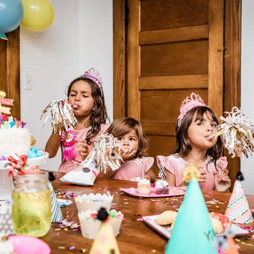 Pink tiara and dress kids birthday party with cake and confetti from Parte Haus party supply store in Bethesda MD