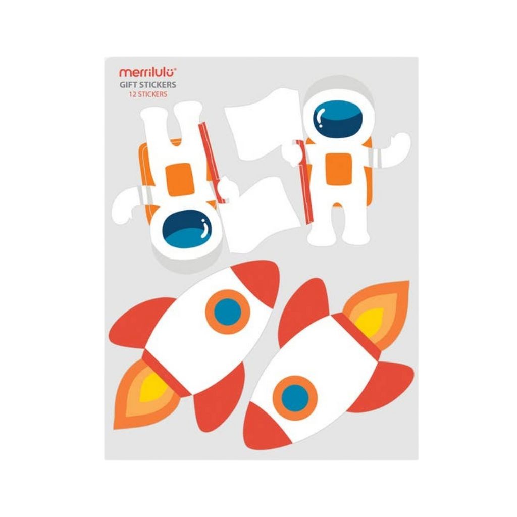 Orange and white astronaut and rocket ship gift stickers space theme from Parte Haus party supply store in Bethesda MD.
