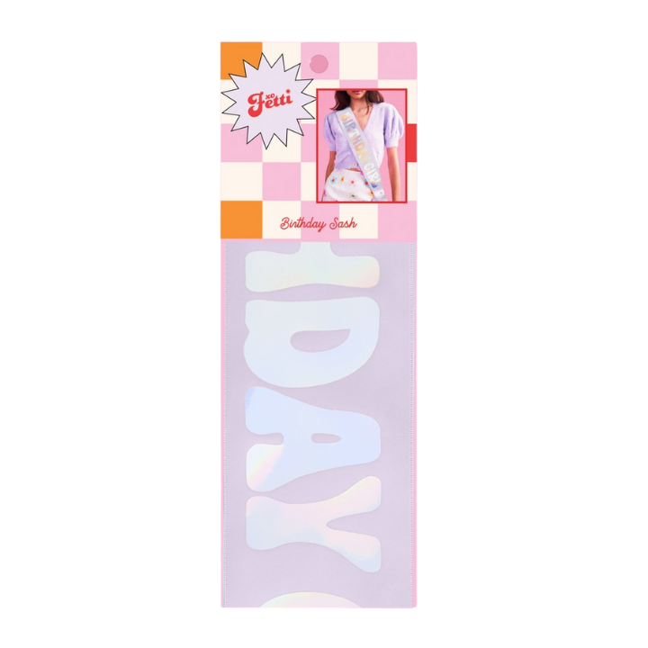 Iridescent birthday sash with bold white text for birthday theme from Parte Haus party supply store in Bethesda MD