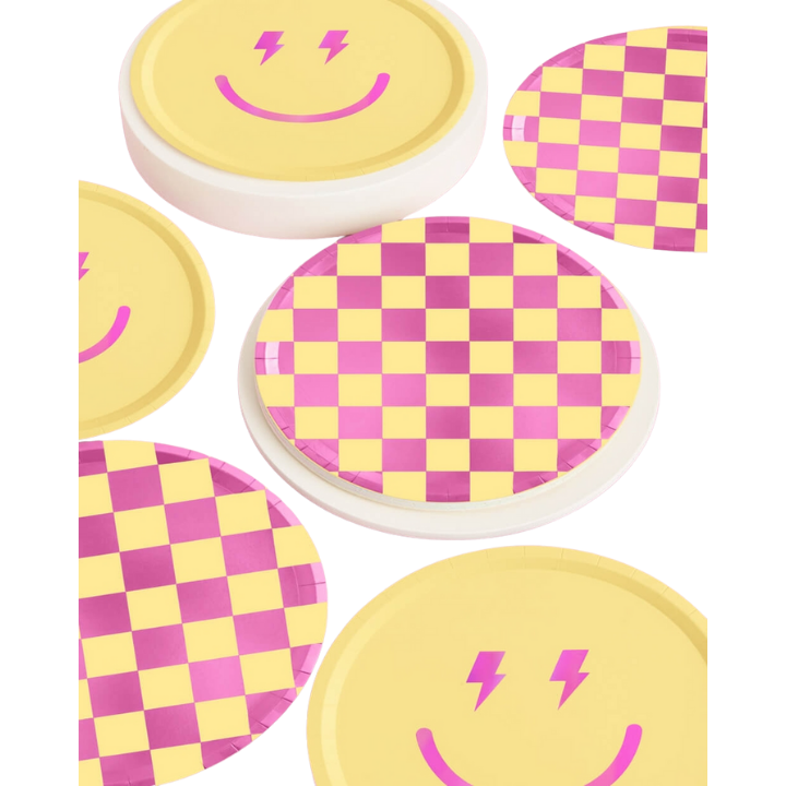 Yellow and pink checkered and smiley face plates retro party tableware from Parte Haus party supply store in Bethesda MD