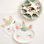 White unicorn face napkins with gold and pastel accents for birthday theme from Parte Haus party supply store in Bethesda MD