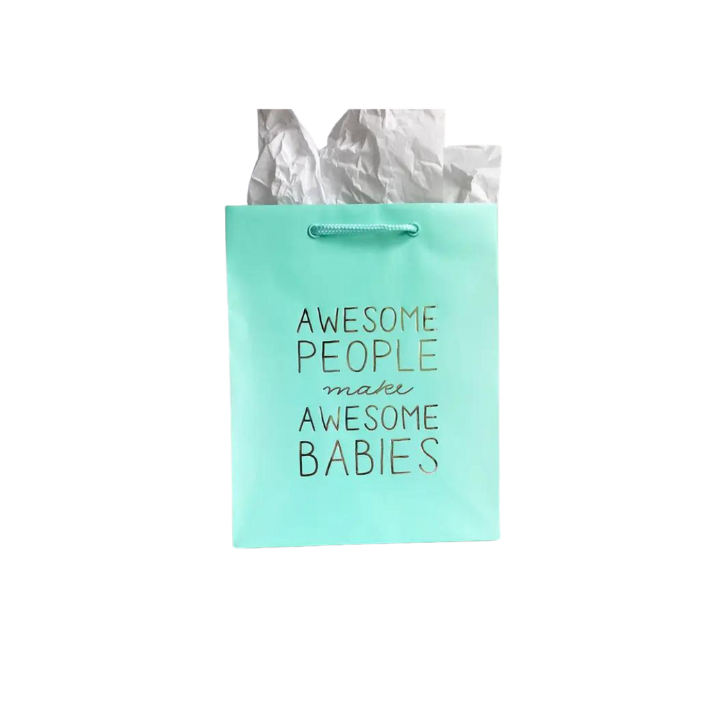 Mint green gift bag with gold text for baby shower from Parte Haus party supply store in Bethesda Maryland.