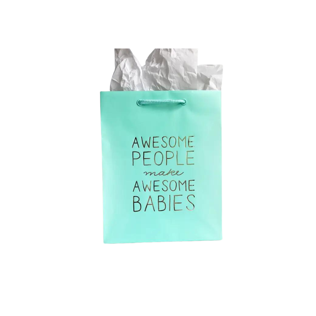 Mint green gift bag with gold text for baby shower from Parte Haus party supply store in Bethesda Maryland.