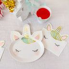 White unicorn face plates with gold and pastel details for birthday theme from Parte Haus party supply store in Bethesda Maryland