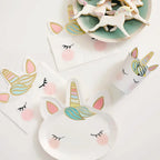 White unicorn cups with pastel gold details and matching napkins for birthday from Parte Haus party supply store in Bethesda Maryland
