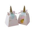White unicorn favor box with pastel details and golden horn for birthday from Parte Haus party supply store in Bethesda MD