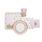 Pink and gold gingerbread city holiday tableware set for Christmas from Parte Haus party supply store in Bethesda MD
