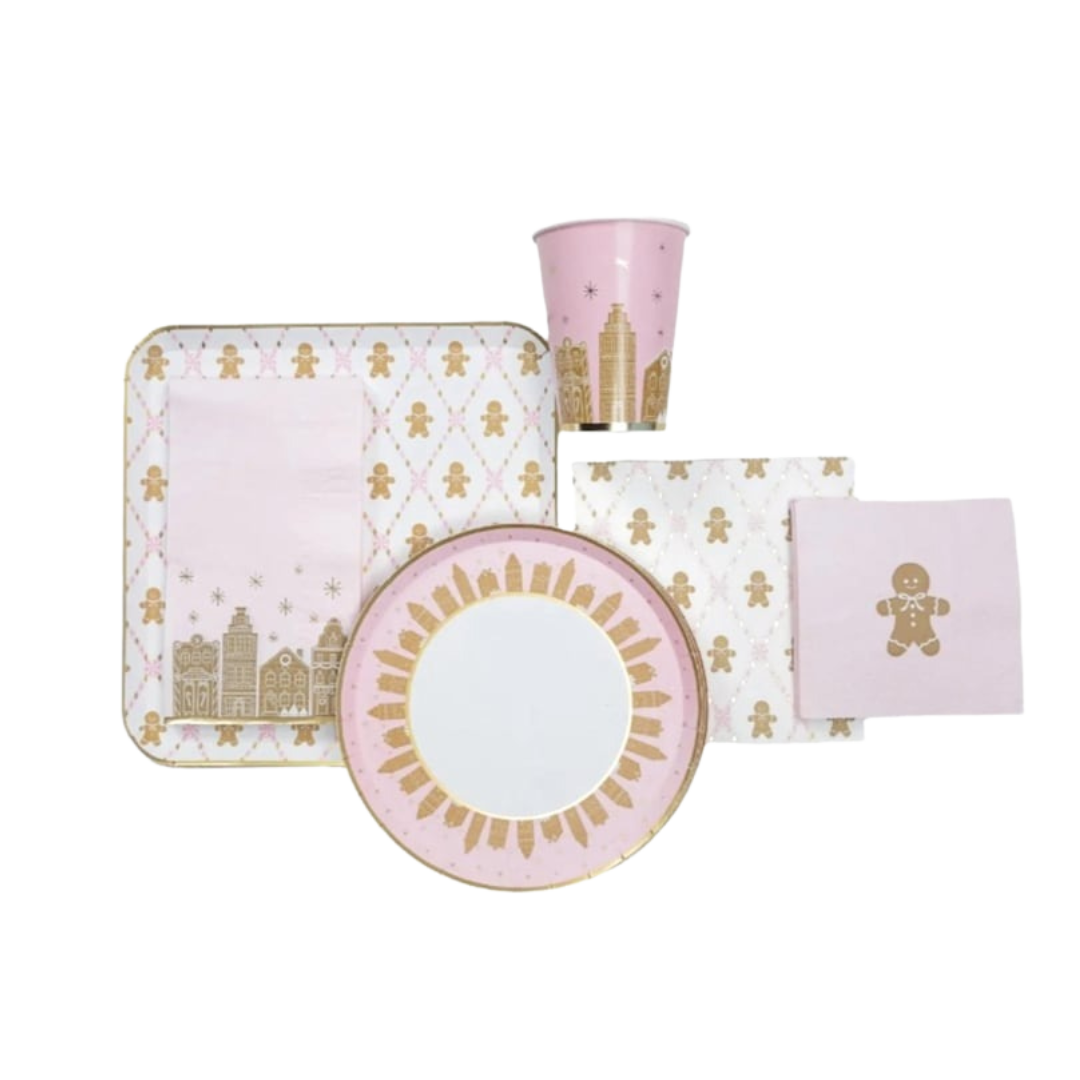 Pink and gold gingerbread city holiday tableware set for Christmas from Parte Haus party supply store in Bethesda MD