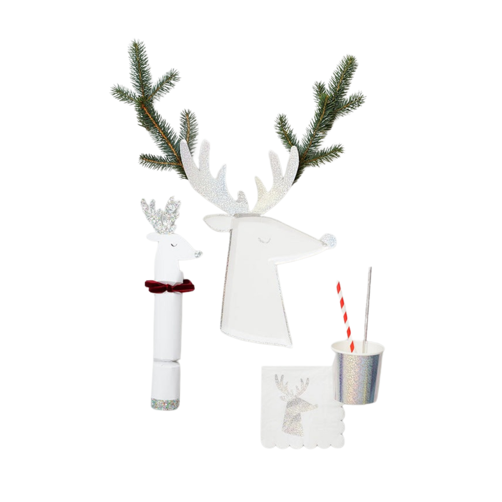 White reindeer Christmas decoration set with glitter and greenery from Parte Haus party supply store in Bethesda Maryland