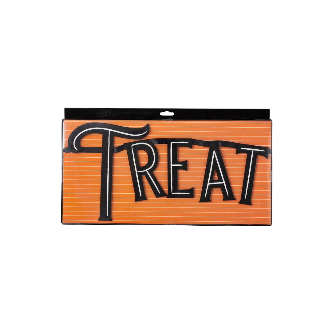 Orange treat sign with bold black letters for Halloween from Parte Haus party supply store in Bethesda MD.