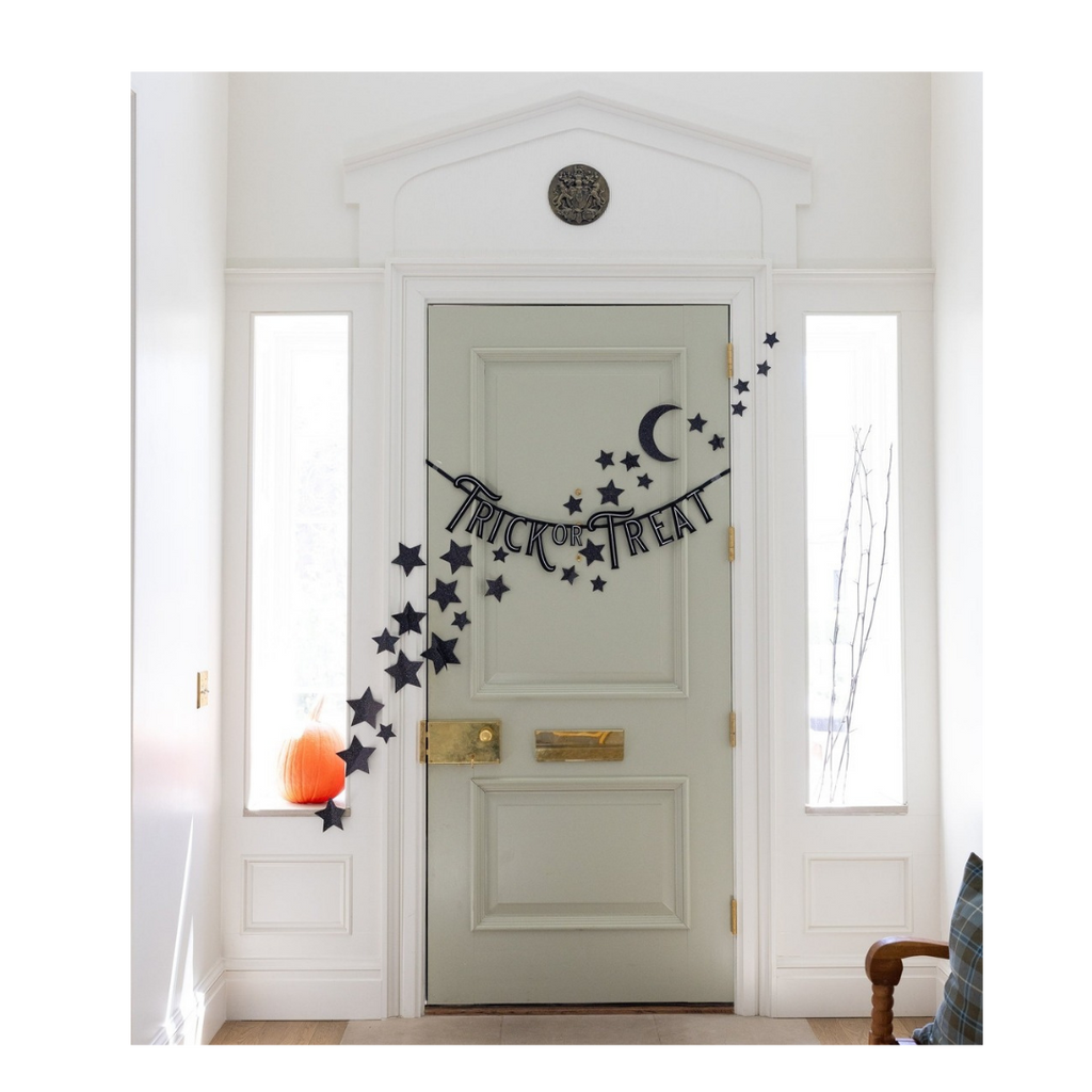 Black Halloween Trick or Treat garland with stars and moon decoration for Halloween from Parte Haus party supply store in Bethesda Maryland