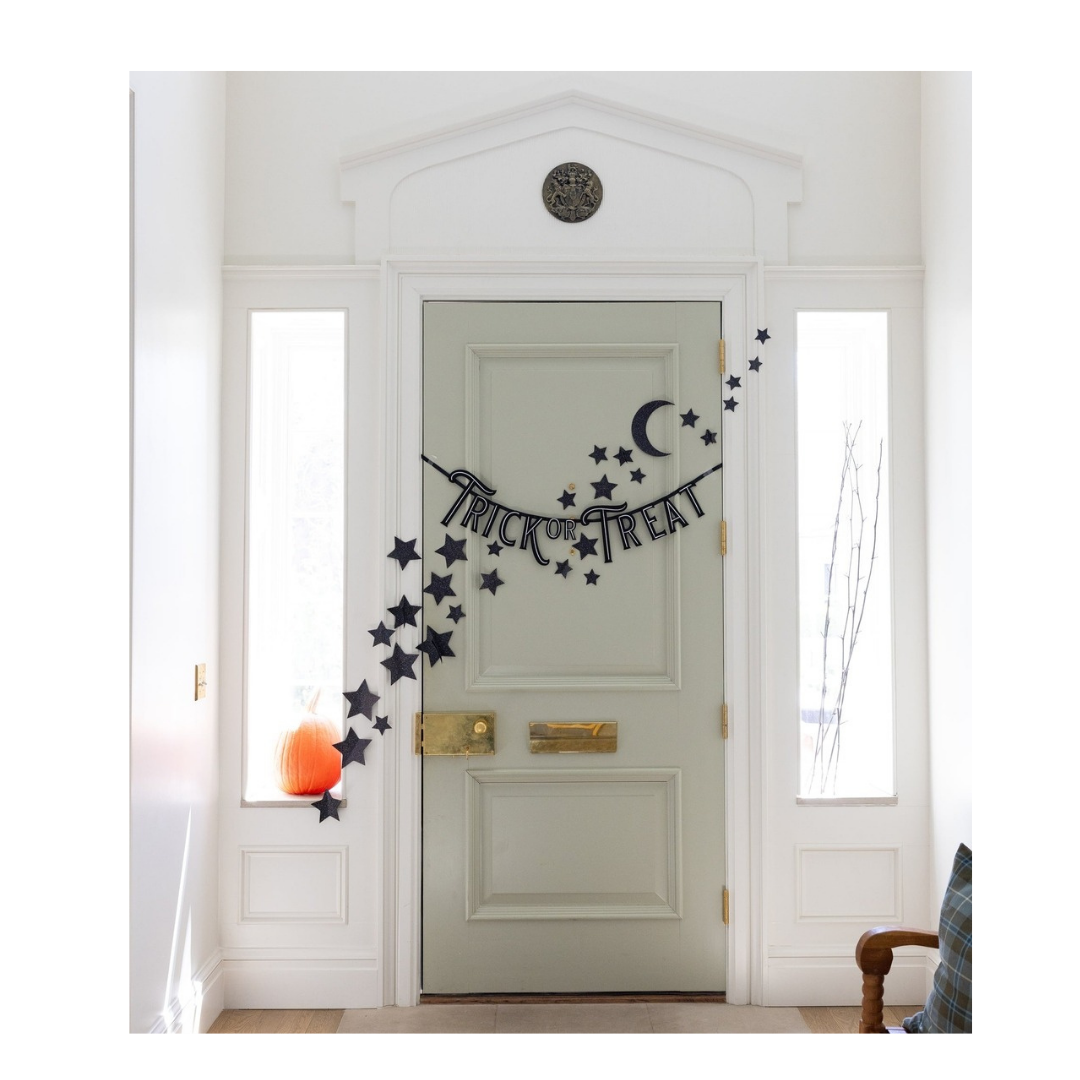Black Halloween Trick or Treat garland with stars and moon decoration for Halloween from Parte Haus party supply store in Bethesda Maryland