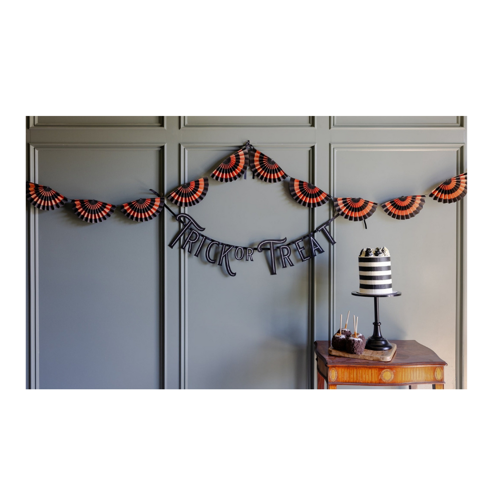 Black and orange fan garland wall decoration Halloween theme from Parte Haus party supply store in Bethesda Maryland