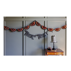 Black and orange fan garland wall decoration Halloween theme from Parte Haus party supply store in Bethesda Maryland