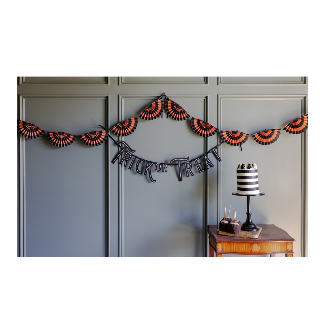 Black and orange fan garland wall decoration Halloween theme from Parte Haus party supply store in Bethesda Maryland