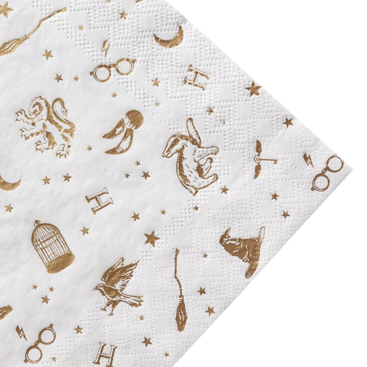 White wizard theme napkin with gold magical symbols for birthday event from Parte Haus party supply store in Bethesda MD