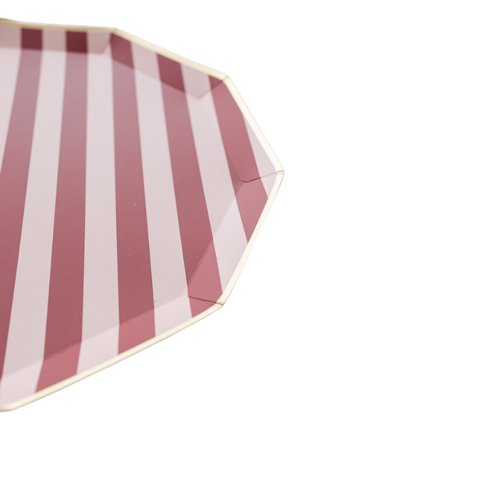 Pink striped octagon plate with gold rim for birthday party from Parte Haus party supply store in Bethesda MD